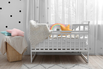 Canvas Print - Comfy baby crib near window in children's room