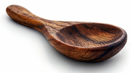 A wooden spoon is isolated on a white background