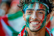 portrait of an Italian football fan, he has the Italian national flag painted on his face