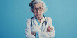 © RealPeopleStudio - Ugly evil old woman doctor furious with the patient on blue background.