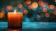 © Tati - Lit candle with warm glow and soft bokeh lights in background