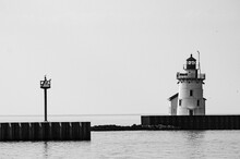 Lighthouse On The Pier