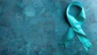 © Tati - Teal awareness ribbon on textured background