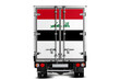 A truck with the national flag of  Iraq depicted on the tailgate drives against a white background. Concept of export-import, transportation, national delivery of goods