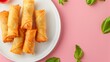 Flat lay fried spring roll crunchy snack homemade on white plat isolated pink