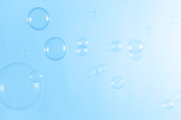 Wall Mural - Beautiful Transparent Soap Bubbles Floating in The Air. Celebration Festive Backdrop. Freshness Soap Suds Bubbles Water. Abstract Blue Textured Background.	