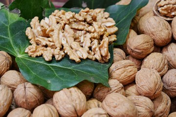 Sticker - stack of natural walnuts selling at shop 