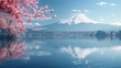 Mount Fuji and cherry blossom reflection on Lake Kawaguchiko, Japan. Blue sky, Spring, Sakura