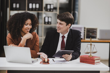 Wall Mural - Lawyer or judge consult, Two female lawyers discussing about contract and agreement concept.