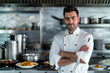 © Sunday Cat Studio - A chef stands in a kitchen