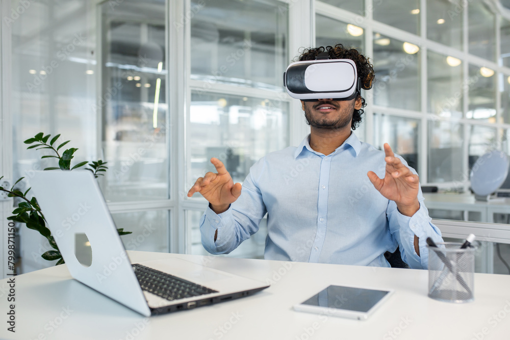 Vr Workplace Computer Stock-Foto „Curly-haired young professional immersed in virtual reality ...