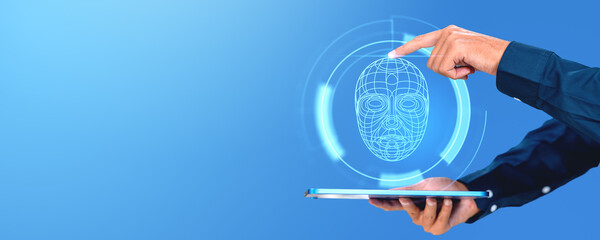 Poster - A person interacting with a holographic face recognition interface on a tablet, set against a blue background, illustrating the concept of biometric security