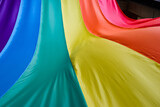 Fototapeta Niebo - Fabric texture rainbow flag symbol of love or LGBT pride concept. pride month celebrates the festival background.