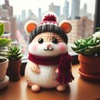 Crocheted hamster in winter gear on windowsill with plants