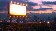 Blank billboard at sunset in the middle of a big city with a lot of lights and cars passing by