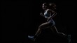 © Oulaphone - Athletic woman sprinter wearing in the sportswear running on black background , Fitness and sport motivation. Runner concept.