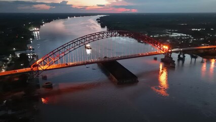 Wall Mural - aerial view of a coal barge passing through a South Kalimantan river