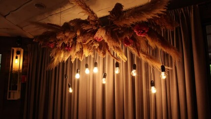 Poster - light bulbs on the wall in the presidium of the newlywed wedding couple