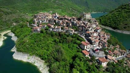 Poster - most beautiful villages of Italy - Castel di Tora, scenic Turano lake , Lazio region Rieti province. aerial high angle drone video
