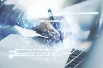 Aufkleber - Multi exposure of abstract software development hologram with world map and hand writing in notebook on background with laptop, global research and analytics concept