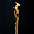 Olympic games flame. Burning torch on black background. 