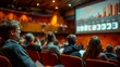 © ธนากร บัวพรหม - Documents with diagrams projected on a screen in an auditorium, with the audience in the foreground