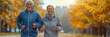 An active senior couple enjoys jogging together outdoors, radiating happiness and vitality in nature's embrace