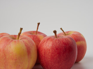 Wall Mural - Shiny red apples, isolated on white background.