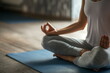 © MarGa - Woman in yoga pose on mat, concept of health and mindfulness