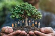 © Wan - A businessman cradles a vibrant green tree sapling in soil, symbolizing environmental responsibility and sustainability in business.