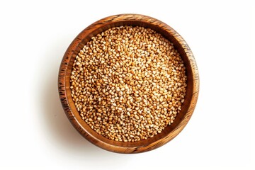Wall Mural - Overhead shot of sesame seeds in wooden bowl on white background