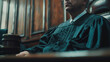 the judge in the robe in the frame is the lower half of the face