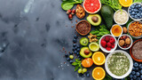 Fototapeta Młodzieżowe - An overhead shot of various superfoods in vibrant bowls arranged artistically on a grey textured background