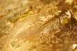 An image showcasing the intricate detail and shimmering texture of gold leaf applied to a surface - Generative AI