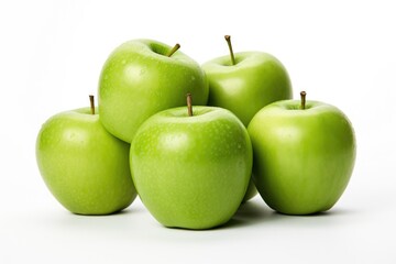 Ripe green apples on a white background. Close-up.