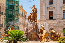 Syracuse, Sicily, Italy. Diana Fountain - Classic Fountain With A Statue Of The Goddess Of The Hunt Diana, Created In 1907 By Sculptor Giulio Moschetti. Sunny Summer Day