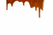 Dripping caramel sauce texture on a white background