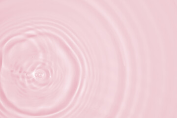 Wall Mural - Abstract transparent water shadow surface texture natural ripple on pink background