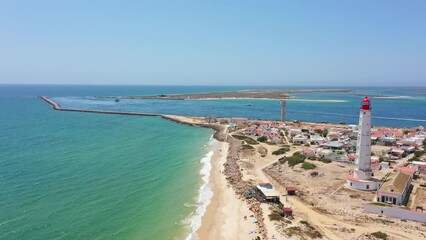 Sticker - Aerial view of the Ilha do Farol lighthouse island located in the Algarve tourist region on Portugal's southern coast. View of the Ria Formosa.