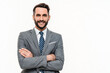 Cheerful young Caucasian businessman wearing formal attire with arms crossed isolated over white background. Successful and confident employee worker lawyer portrait