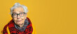 Elderly woman wearing glasses, looking up into camera. Funny looking wide angle studio photo banner copy space on side. Generative AI