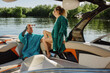 © Julie Meme/Stocksy - Couple Relaxing on a Luxury Boat in Summer