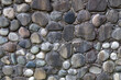 A wall made of rocks with a gray and white color