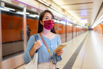 Sticker - Woman wear face mask at metro station in Hong Kong city