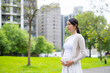 Asian Pregnant woman at the park