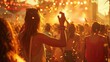 © Rattanathip - A young woman is dancing at a music festival. She is wearing a white tank top and has her arms in the air. She is surrounded by other people who are also dancing and enjoying the music.
