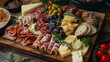 Wooden boards cold meat various cheeses fruit