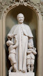 VICENZA, ITALY - NOVEMBER 6, 2023: The carved statue of St. Don Bosco in the church Chiesa di San Gaetano by  Orazio A. Marzari (1999).
