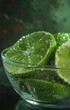 Close up of a slice of a lime with water droplets forming