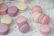 Macarons in white, purple and pink
